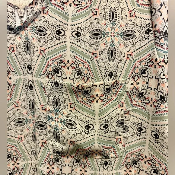 Maurices White and Green Blouse with Playful Pattern and Short Sleeves - Picture 2 of 10